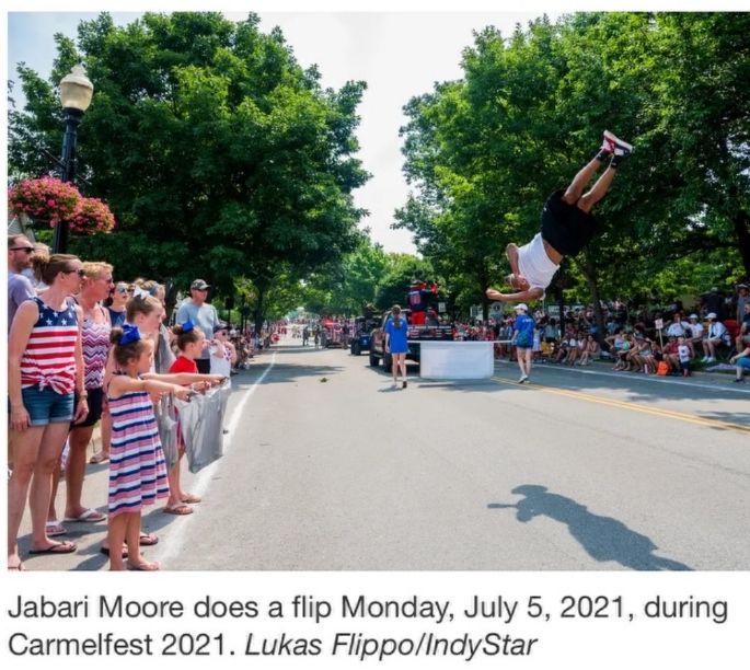 Jabari does a flip at CarmelFest Parade